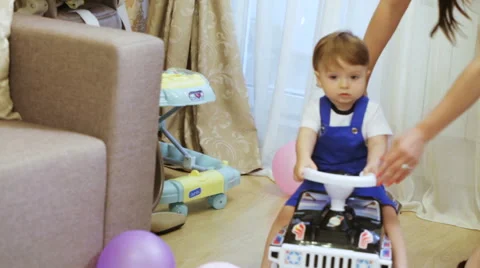 Child on machine at home 스톡 동영상 65417363