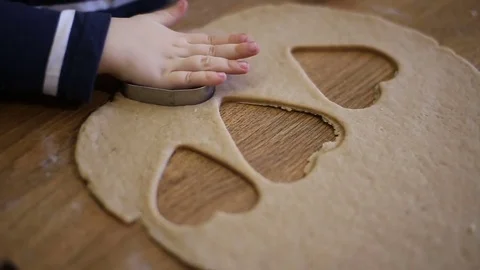Child makes biscuits for baking Stock Footage 74403424