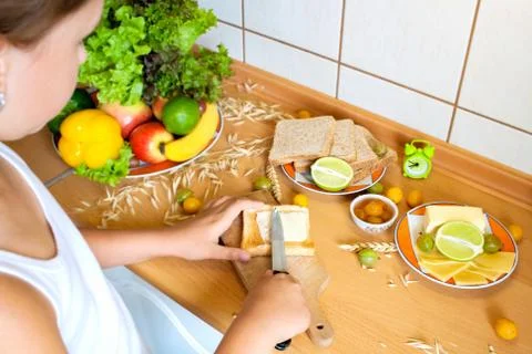 The child makes a breakfast Stock Photos
