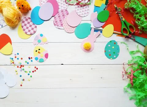 The child makes crafts with his own hands for the Easter. Stock Photos
