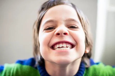 Child makes grimaces Stock Photos