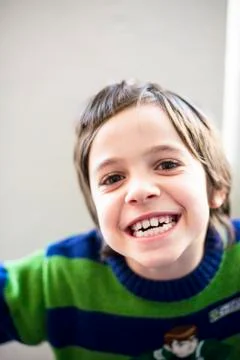 Child makes grimaces Stock Photos