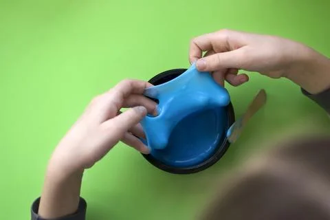 The child makes slime. Selective focus Stock Photos