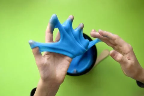 The child makes slime. Selective focus Stock Photos