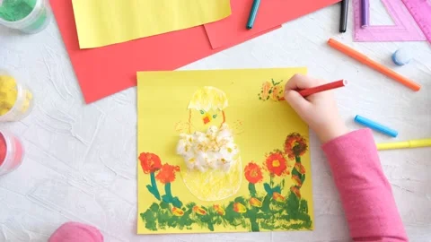 Child making card with Easter chick from colorful paper Stock Footage 167011051