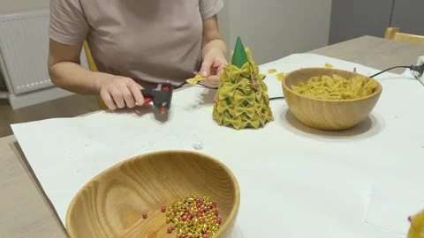 Child Making Christmas Tree Craft From Tissue Paper And Green Plasticine Stockbeeldmateriaal 341985870
