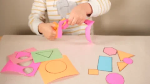 Child making geometric shapes Stock Footage 258046939
