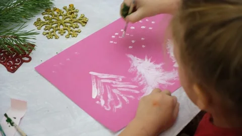 Child making a greeting card. Craft for children. Stock Footage 236798271