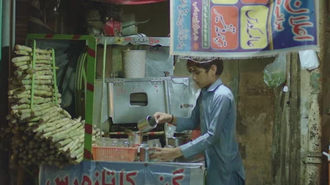Child Making Juice some where in Pakistan 20 July 2023 Editorial Stock Stock Footage 279254362