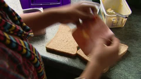 Child making sandwich overhead Stock Footage 11929964