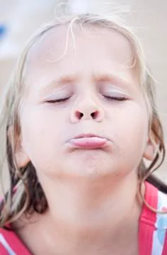 Child making silly face Stock Photos