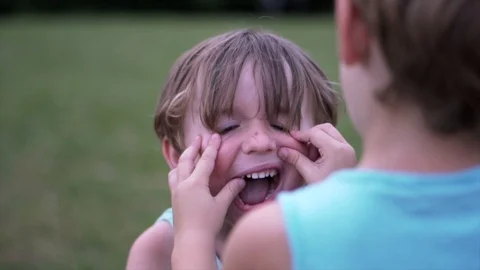 Child Making Silly Faces To Camera, authentic Stock Footage 93448453