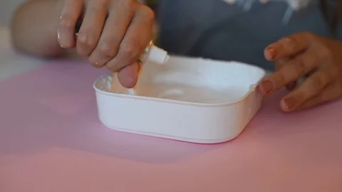 Child making slime himsel - step by step guide. Stock Footage 111879012