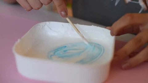 Child making slime himsel - step by step guide. Stock Footage 111879026