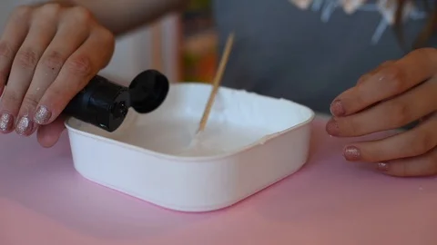 Child making slime himsel - step by step guide. Stock Footage 111879101