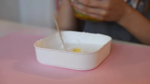 Child making slime himsel - step by step guide. Stock Footage 111879170