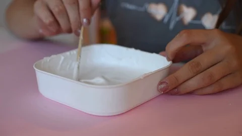 Child making slime himsel - step by step guide. Stock Footage 111879194