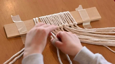 Child making a string arrangement Stock Footage 171414984