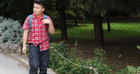 Child with map walking at the nature alone Stock Footage 105473771