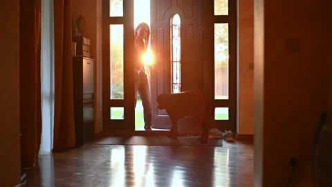 A child meets mom from work. Backlight Stock Footage 135663727