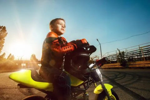 Child on a motorcycle Stock Photos