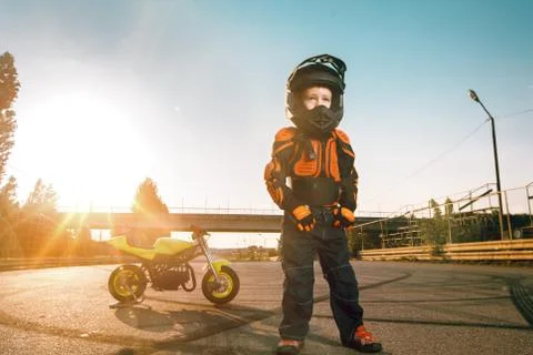 Child on a motorcycle Stock Photos