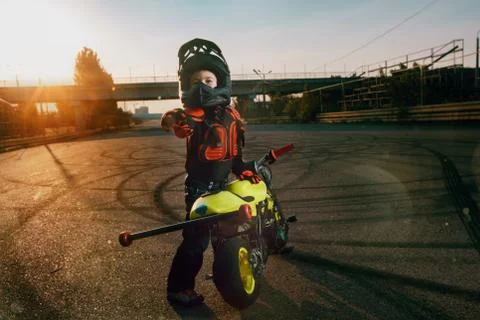 Child on a motorcycle Stock Photos