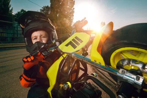 Child on a motorcycle Stock Photos