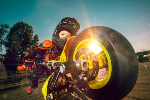 Child on a motorcycle Stock Photos