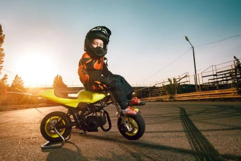 Child on a motorcycle Stock Photos