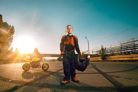 Child on a motorcycle Stock Photos