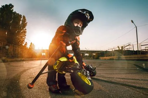 Child on a motorcycle Stock Photos
