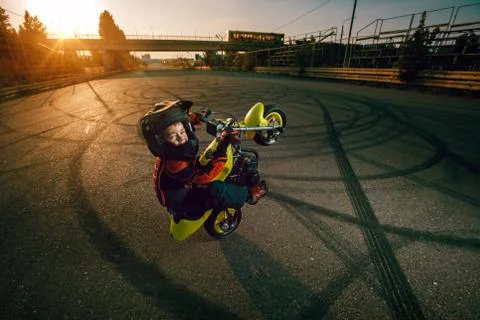 Child on a motorcycle Stock Photos