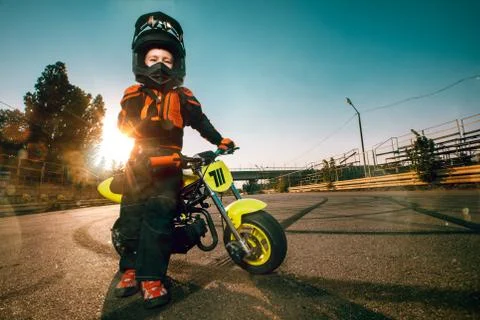 Child on a motorcycle Stock Photos