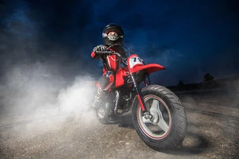 Child on a motorcycle Stock Photos