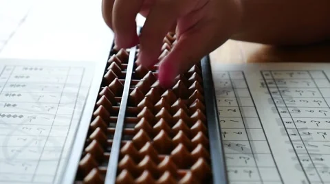 Child moves bones on abacus Stock-Footage 55858966