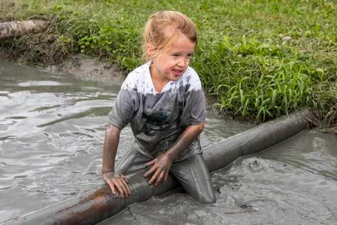 Child Mud Race Stock Photos