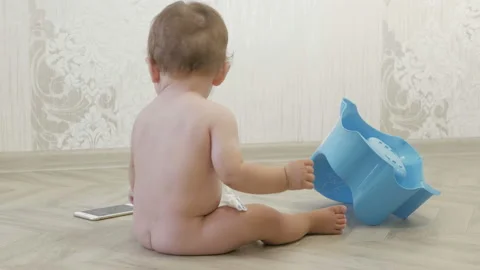 The child next to the pot Stock Footage 124875003