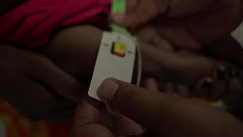Child Nutrition Assessment Using Red Zone Chart in Hospital Stock Footage 331943067