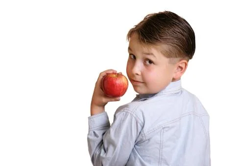 Child with a nutritious apple Stock Photos