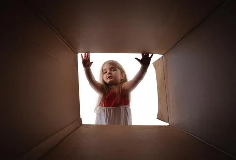 Child opening gift present box Stock Photos