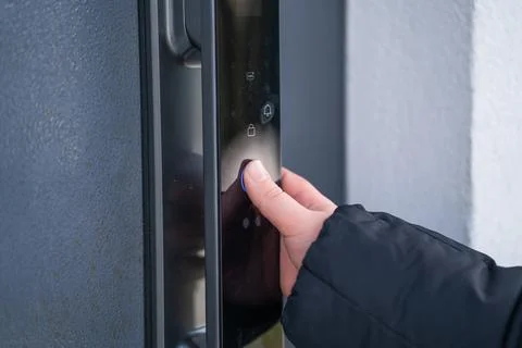 Child opening modern smart lock with fingerprint Stock Photos