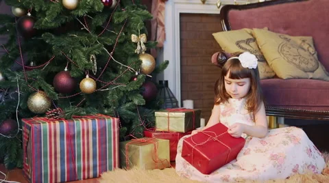 Child opening presents box. New year holiday Vídeo Stock 54767073
