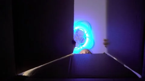 The child opens a box with a gift. View from the box Stock Footage 146369765