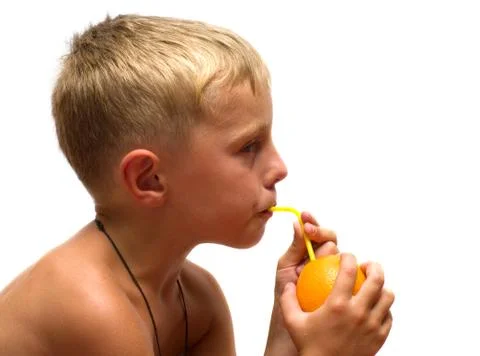Child with an orange. Stock Photos