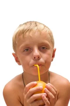 Child with an orange. Stock Photos