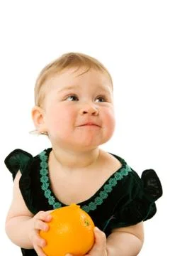 Child with orange Stock Photos