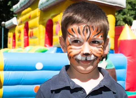 Child with painted face Stock Photos