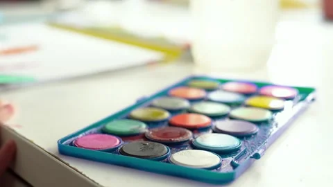 Child paints at class or home closeup. Children art and creativity concept. Stock Footage 301970108