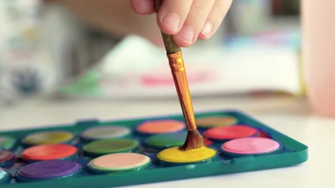 Child paints at class or home closeup. Children art and creativity concept. Stock Footage 301970150
